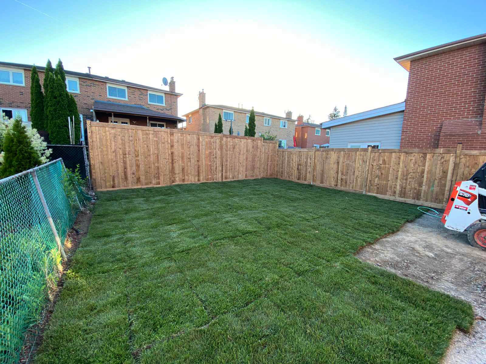 Sod installation and cedar fence process in GTA