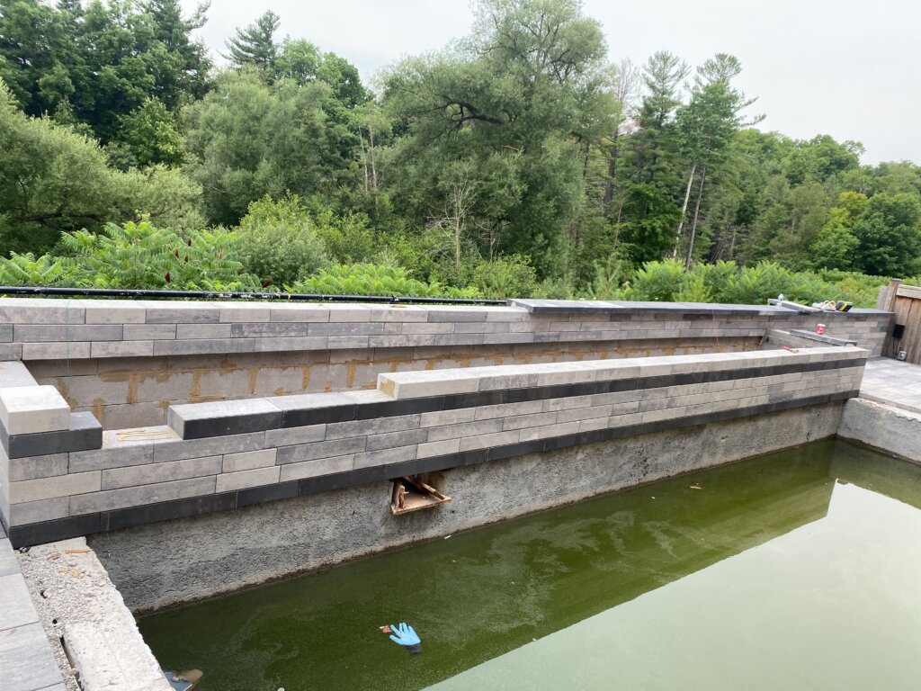 Interlock around Pool RETAINING WALL DESIGN & INSTALLATION